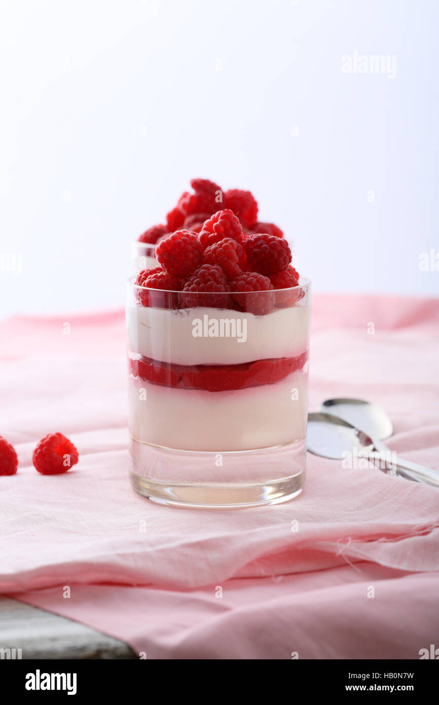 Raspberry dessert in glass Stock Photo Alamy