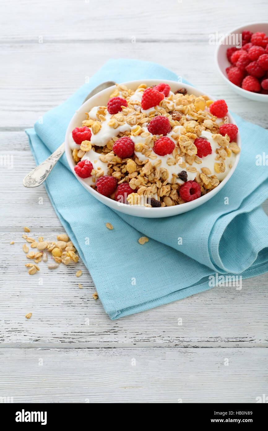 Raspberry muesli with yogurt, healthy food Stock Photo