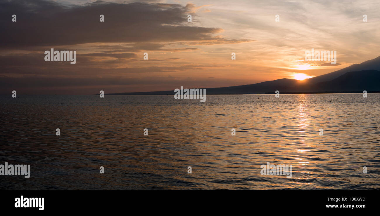 Awesome sunrise and still water on Gili Air Island, Indonesia Stock Photo