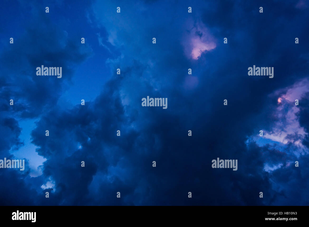 Background of dark clouds before a thunder-storm Stock Photo - Alamy