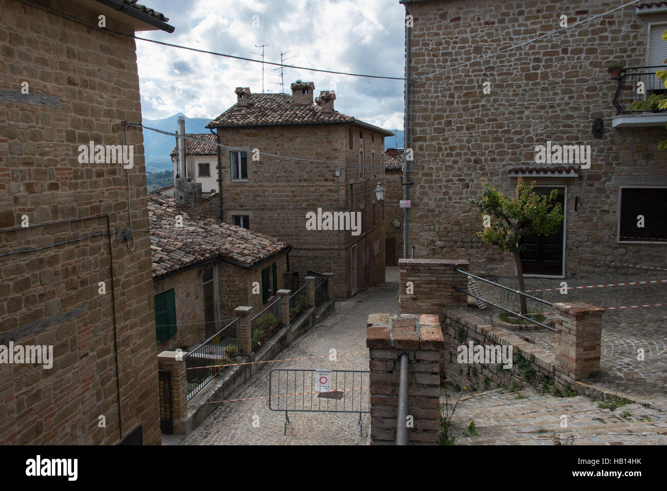 Earthquake damaged buildings in the pretty little hill top town of Gualdo, Marche, Italy Stock Photo