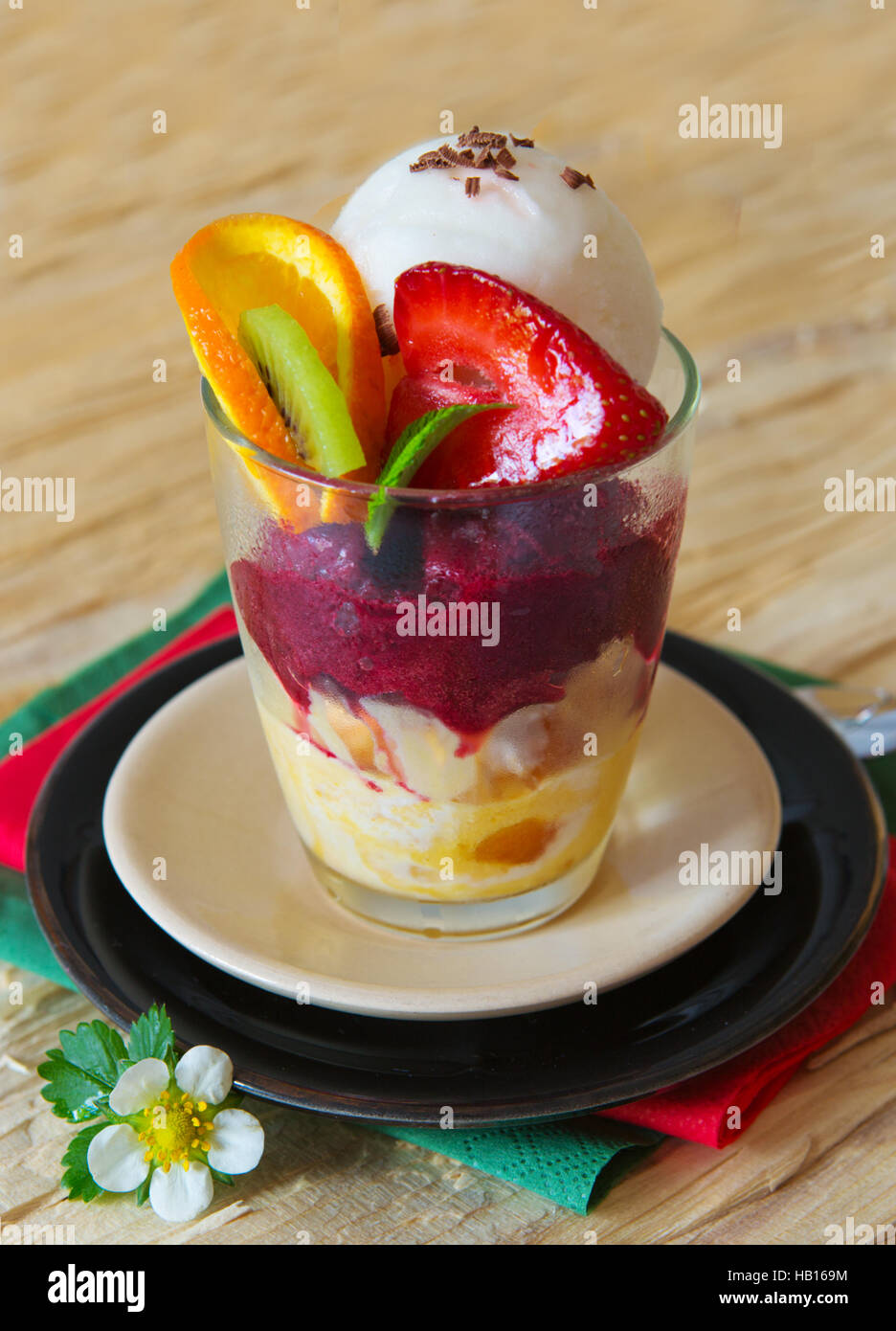 Mixed ice cream with fruits Stock Photo Alamy