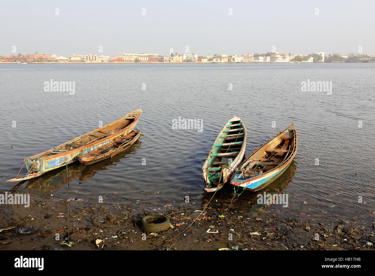 View of South or Sindone district of the city-island from the mainland district of Sor across the river.s Grand Bras-Large Branch downstream from Pont Stock Photo