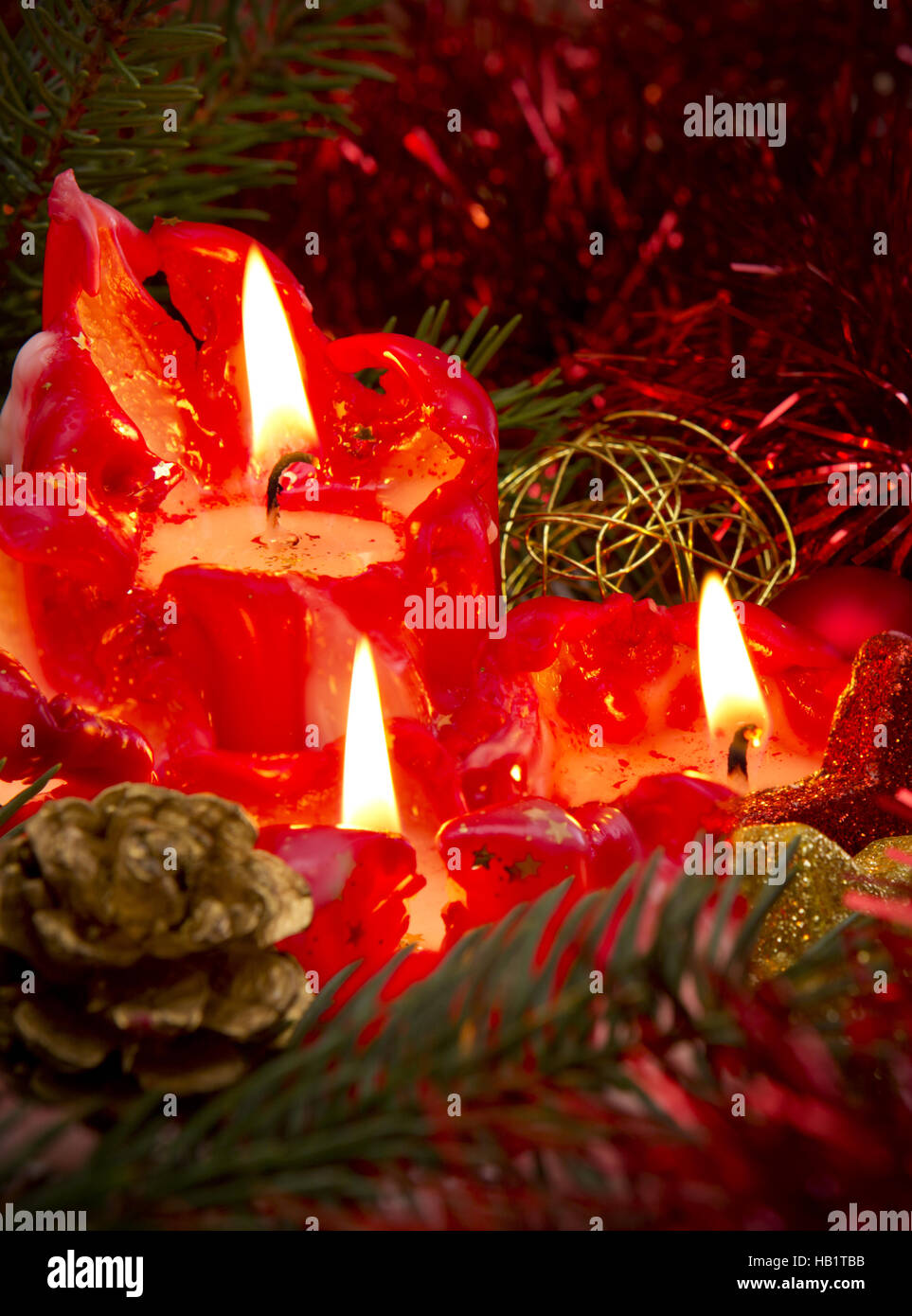 Three red Advent candles Stock Photo Alamy