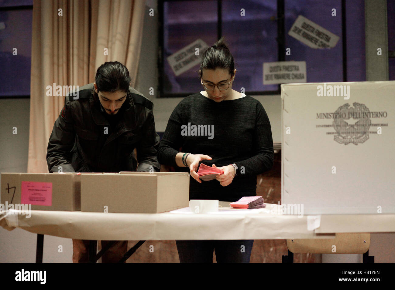 Rome, Italy. 03rd Dec, 2016.  An official affixes labels to a voting booth at a polling station, ahead of the referendum on constitutional reform, in Rome, Italy Credit:  Sara De Marco/Alamy Live News Stock Photo