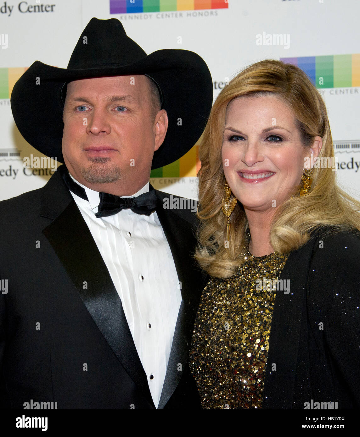 Washington DC, USA. 3rd Dec, 2016. Garth Brooks and Tricia Yearwood arrive for the formal Artist's Dinner honoring the recipients of the 39th Annual Kennedy Center Honors hosted by United States Secretary of State John F. Kerry at the U.S. Department of State in Washington, DC on Saturday, December 3, 2016. The 2016 honorees are: Argentine pianist Martha Argerich; rock band the Eagles; screen and stage actor Al Pacino; gospel and blues singer Mavis Staples; and musician James Taylor. Credit:  MediaPunch Inc/Alamy Live News Stock Photo