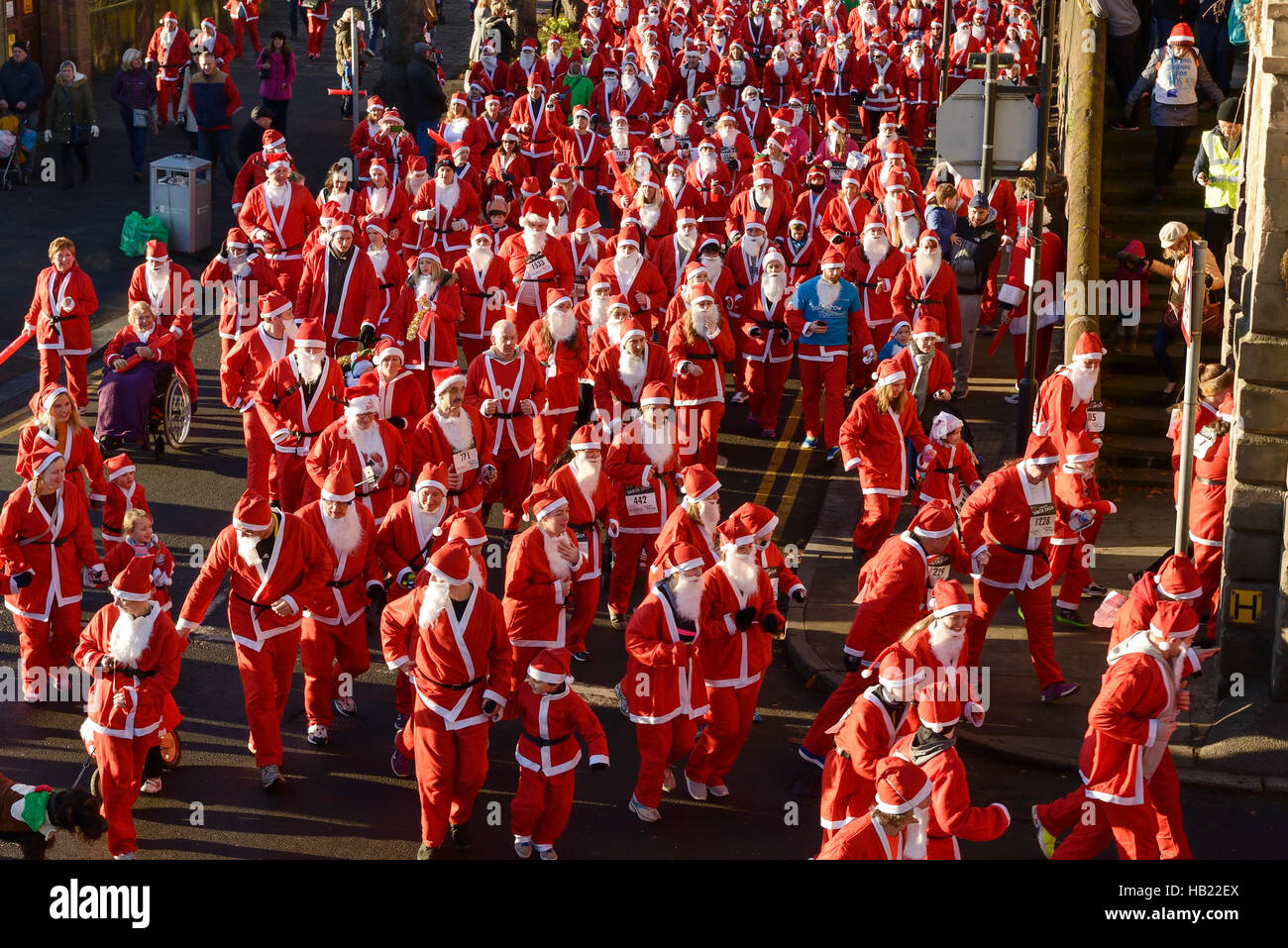 Chester, UK. 4th December 2016. The annual charity santa dash through the city centre streets. Credit: Andrew Paterson/ Alamy Live News Stock Photo