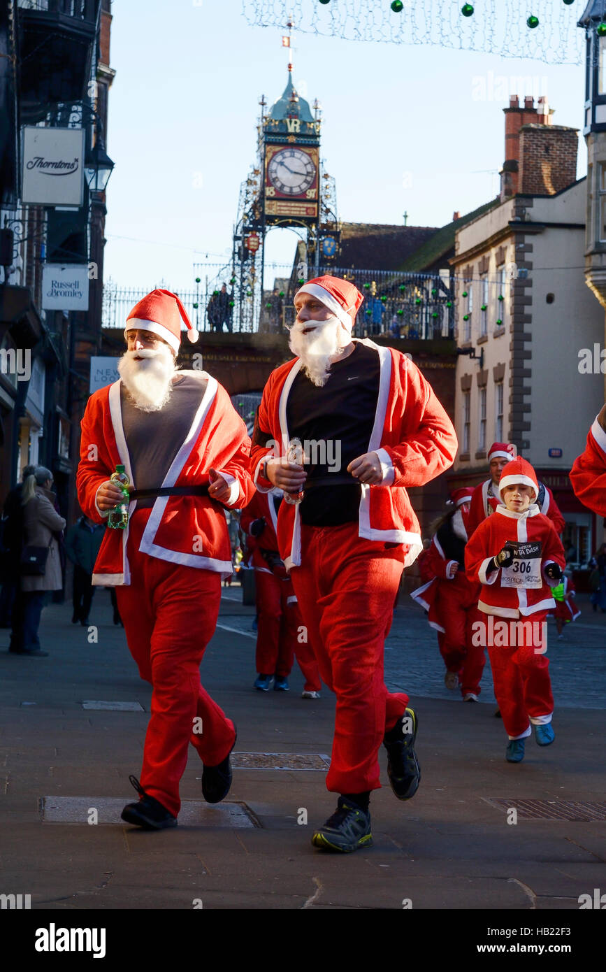 Chester, UK. 4th December 2016. The annual charity santa dash through the city centre streets. Credit: Andrew Paterson/ Alamy Live News Stock Photo