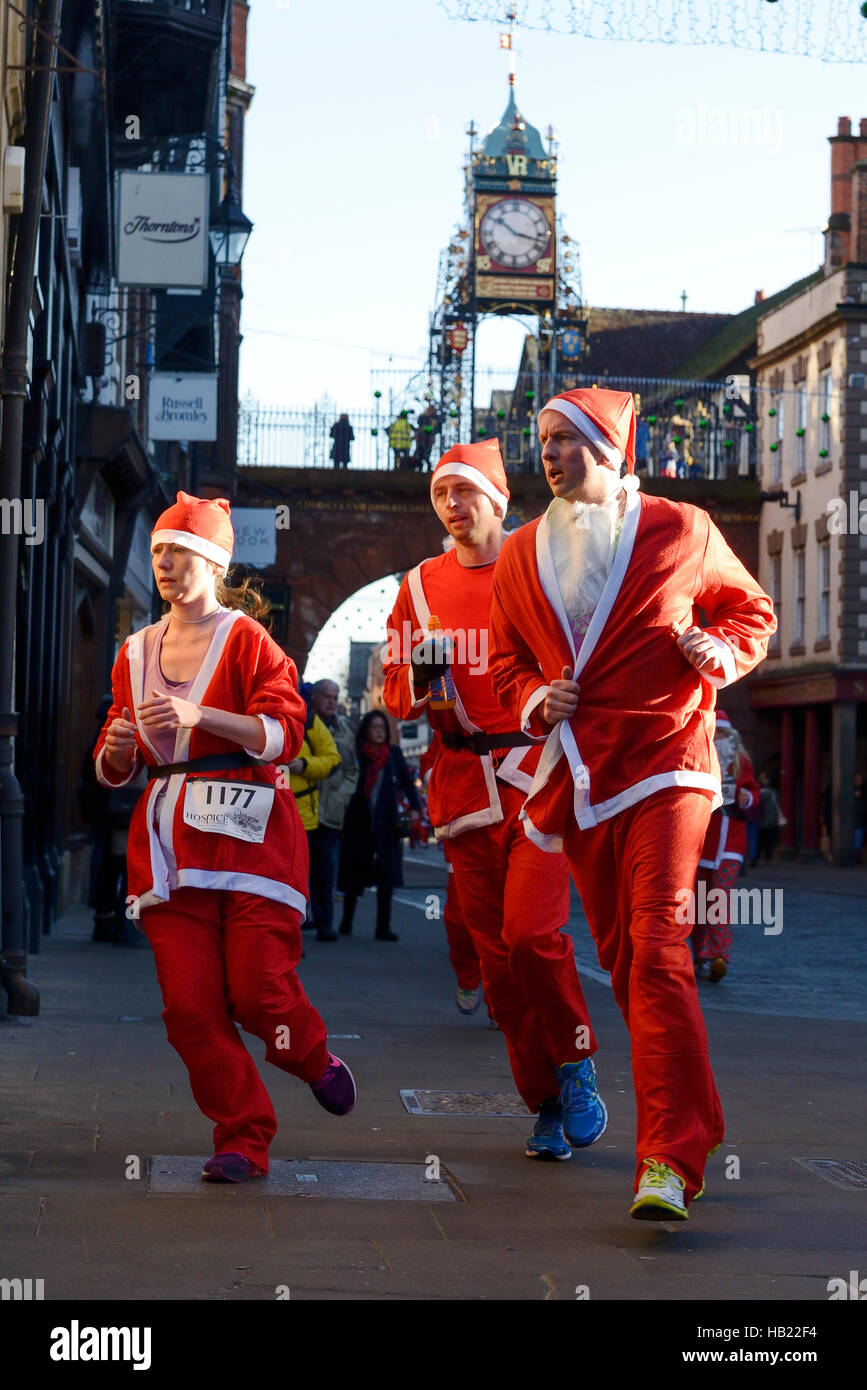 Chester, UK. 4th December 2016. The annual charity santa dash through the city centre streets. Credit: Andrew Paterson/ Alamy Live News Stock Photo