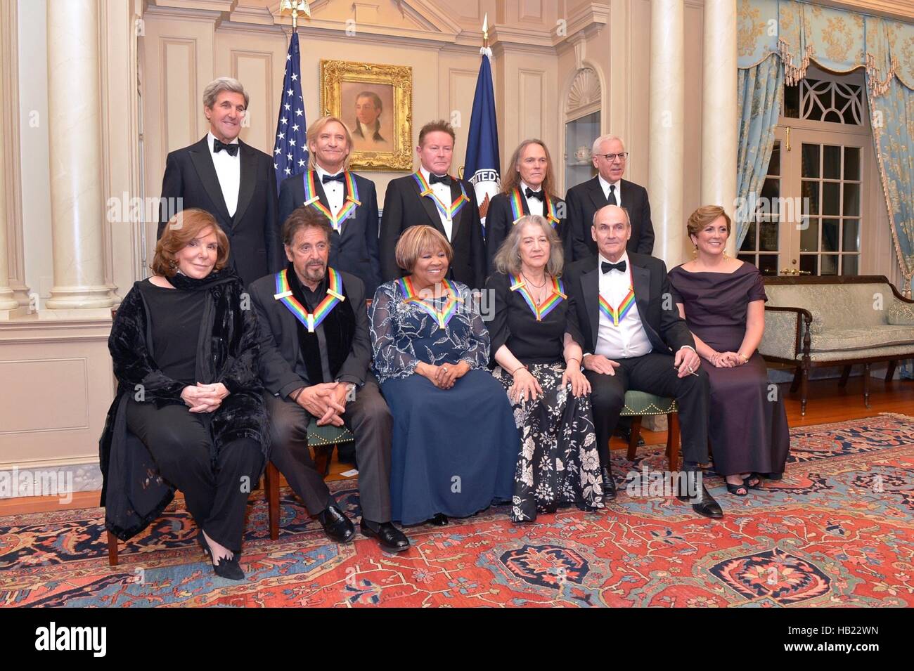Washington DC, USA. 3rd Dec, 2016. U.S Secretary of State John Kerry and his wife Teresa Heinz Kerry pose for a group photo with the 2016 Kennedy Center Honor Award recipients following the gala dinner at the Department of State December 3, 2016 in Washington, DC. First row left to right are: Teresa Heinz Kerry, Al Pacino, Mavis Staples, Martha Argerich, James Taylor, and Kennedy Center President Deborah Rutter; back row, from left, Secretary of State John Kerry, Joe Walsh, Don Henley, Timothy Schmit, and David Rubinstein. Credit:  Planetpix/Alamy Live News Stock Photo