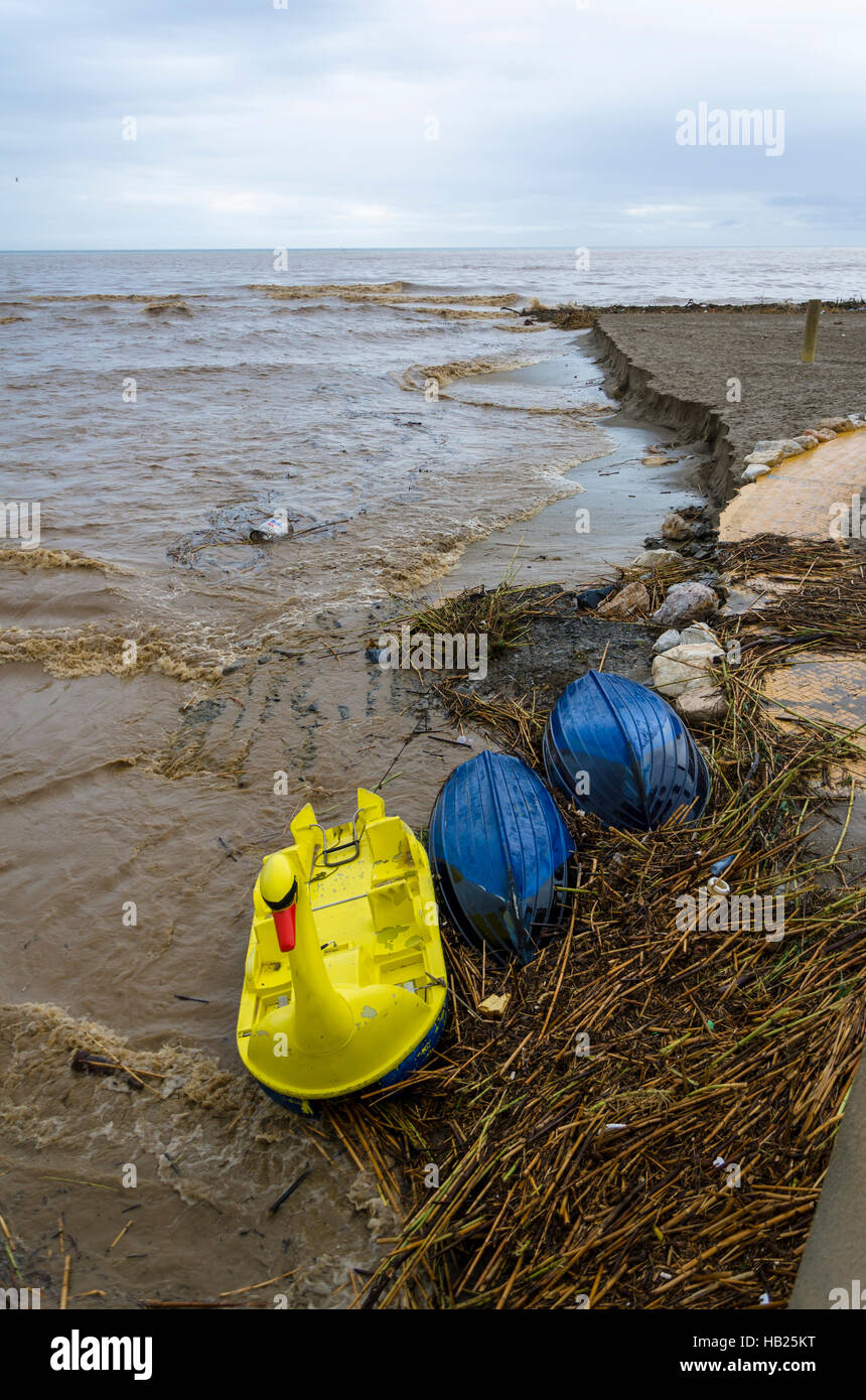 Fuengirola, Andalusia, Spain. 4th december, Fuengirola river becomes Flash flood leaving debris behind at river mouth. 2016. Credit:  Perry van Munster/ Alamy Live News Stock Photo