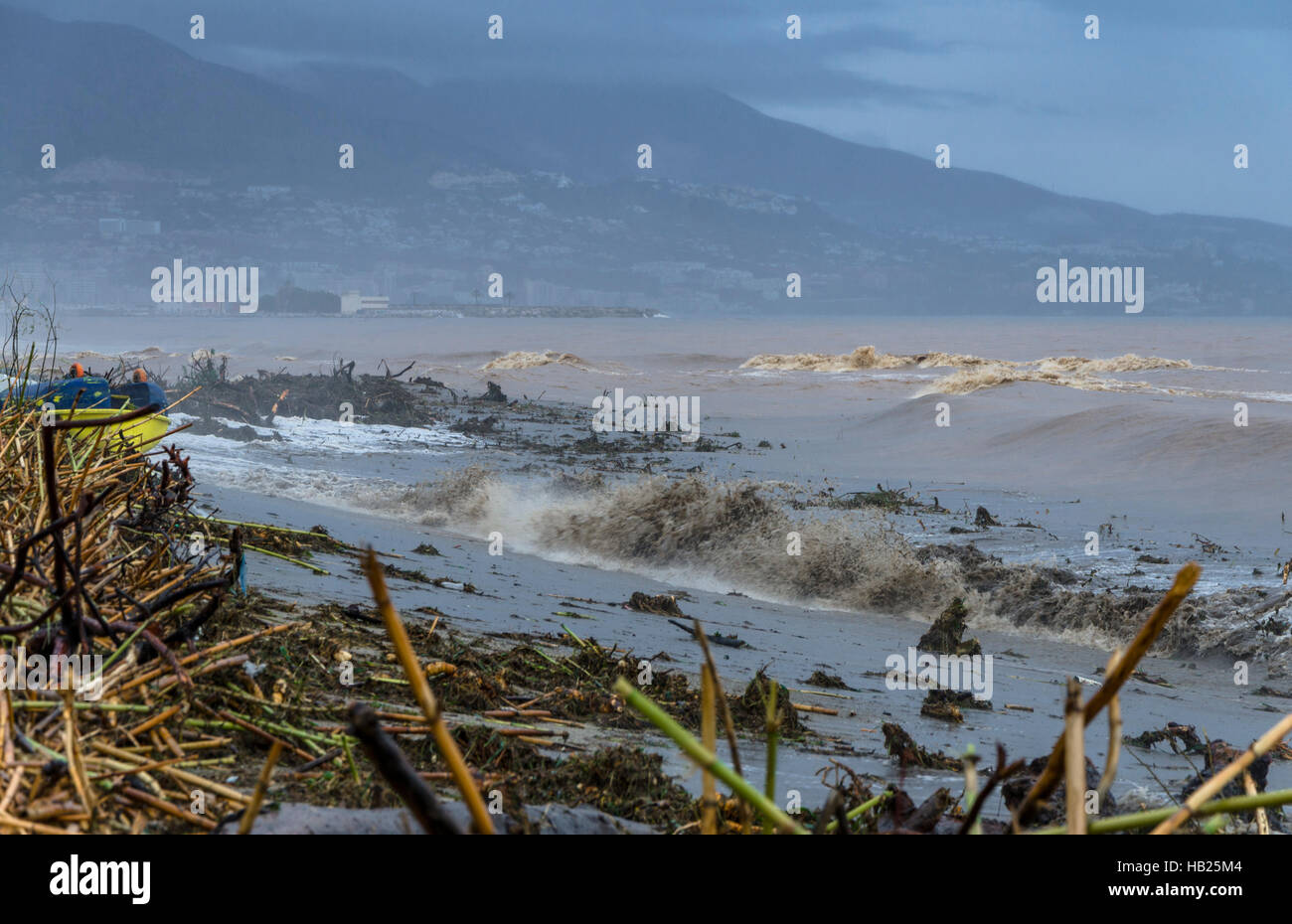Fuengirola, Andalusia, Spain. 4th december, Severe weather, Fuengirola river becomes Flash flood leaving debris behind at river mouth. 2016. Credit:  Perry van Munster/ Alamy Live News Stock Photo