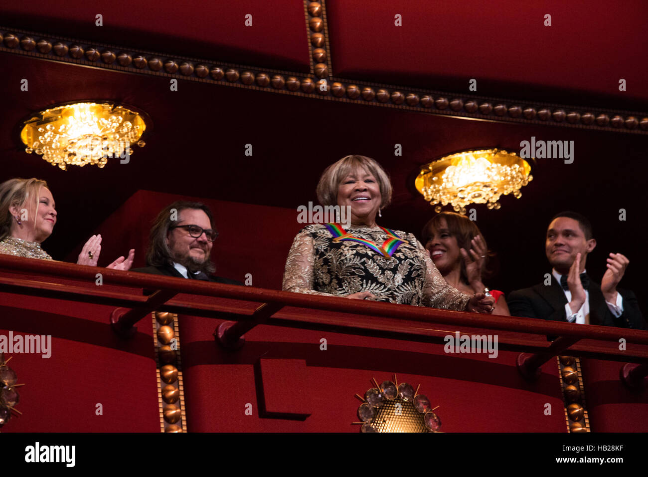 Washington DC, USA. 4th Dec, 2016. 2016 Kennedy Center Honoree singer Mavis Staples waves at the beginning of the Kennedy Center Honors, at the Kennedy Center, December 4, 2016. The 2016 honorees are: Argentine pianist Martha Argerich; rock band the Eagles; screen and stage actor Al Pacino; gospel and blues singer Mavis Staples; and musician James Taylor. Credit: Aude Guerrucci/Pool via CNP /MediaPunch Credit:  MediaPunch Inc/Alamy Live News Stock Photo