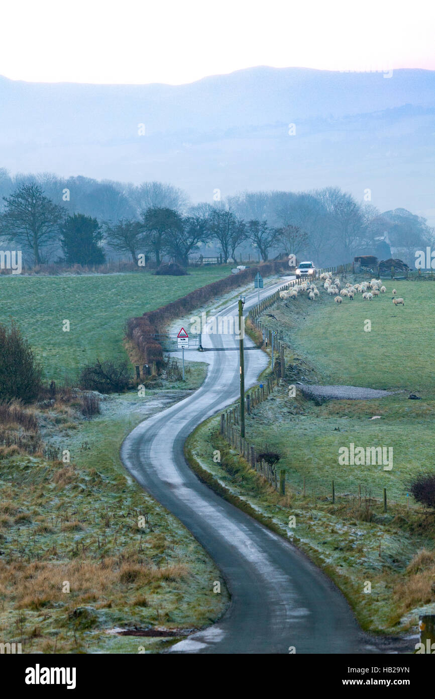 A frozen meandering lane through rural fields in the village of Moely