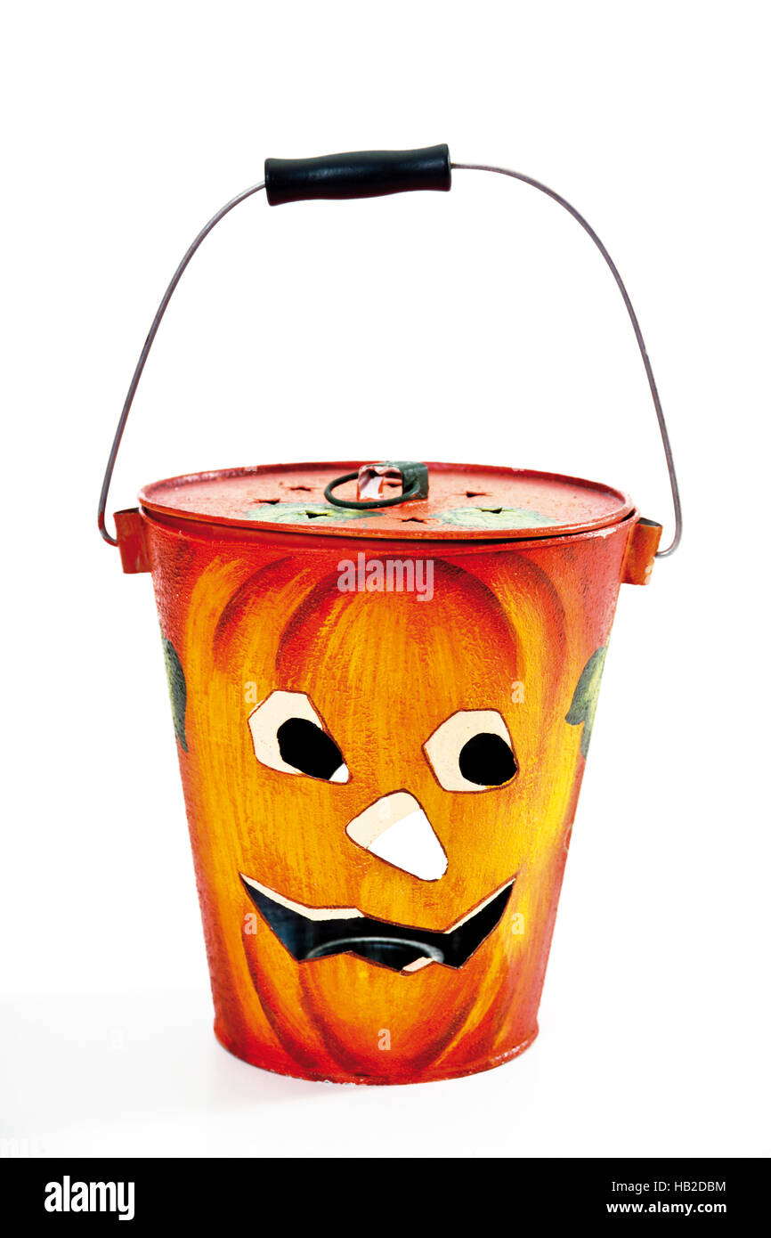 Halloween decorations, bucket with a pumpkinface Stock Photo Alamy