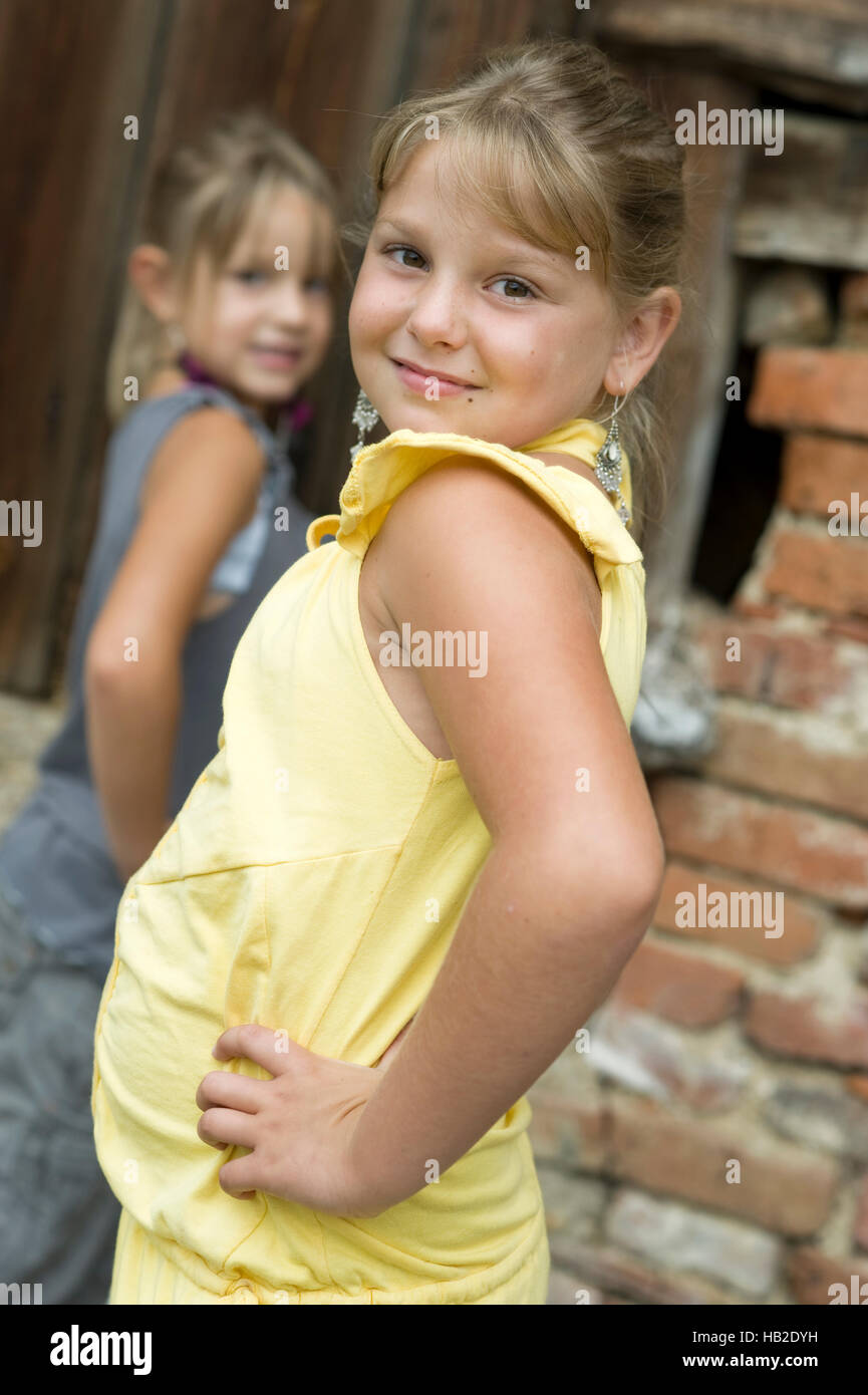 Two blond girls, 6 and 8, portrait Stock Photo