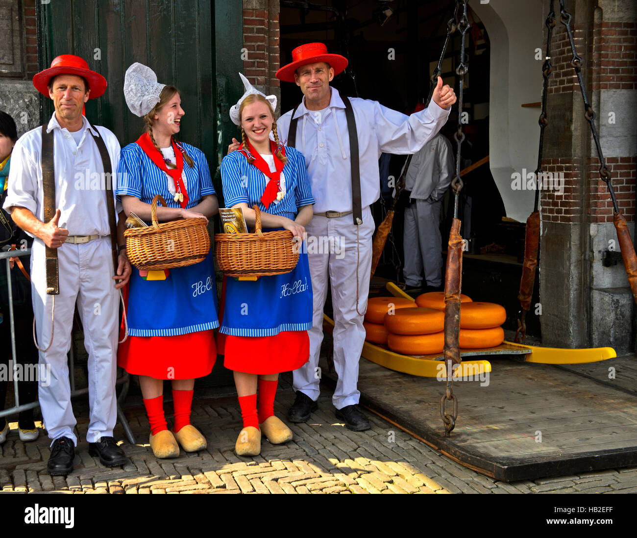 Dutch cheese girls, Kaasmeisje, traditional costume, cheese carriers, cheese market, Alkmaar, Holland, The Netherlands Stock Photo