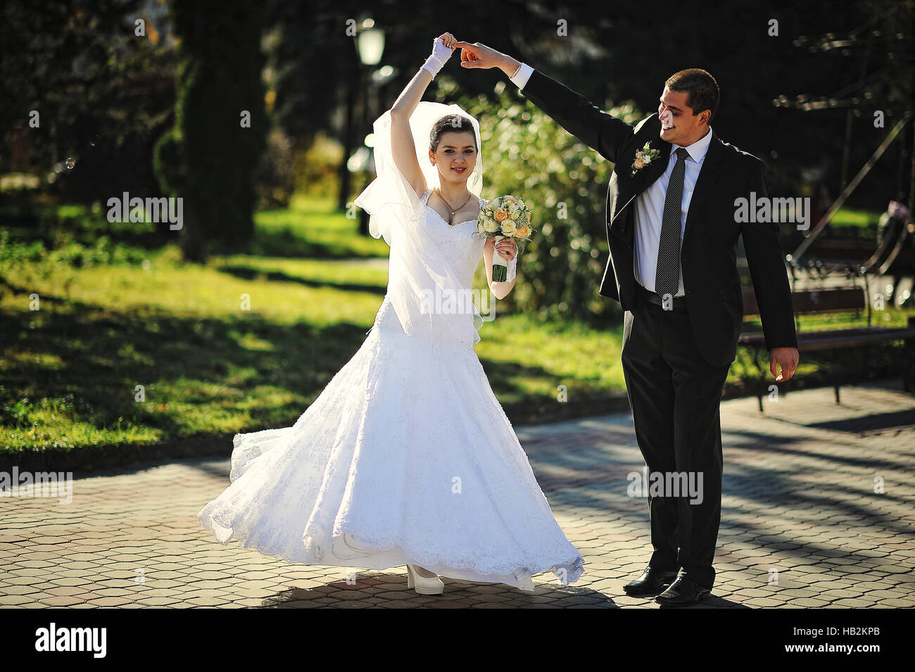 Dancing wedding couple outdoors Stock Photo - Alamy