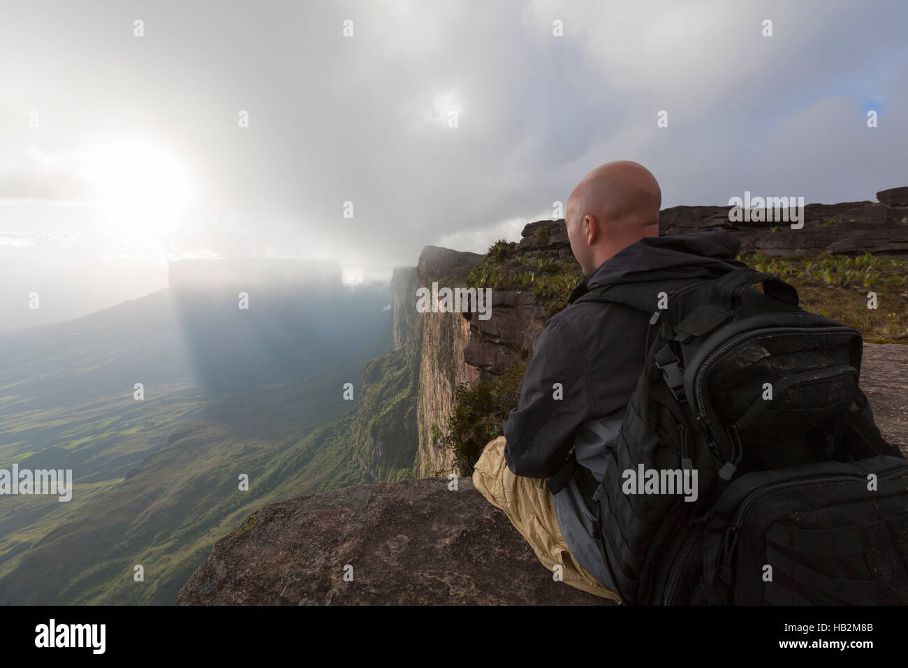 European tourist resting on top of Roraima tepui, Venezuela Stock Photo