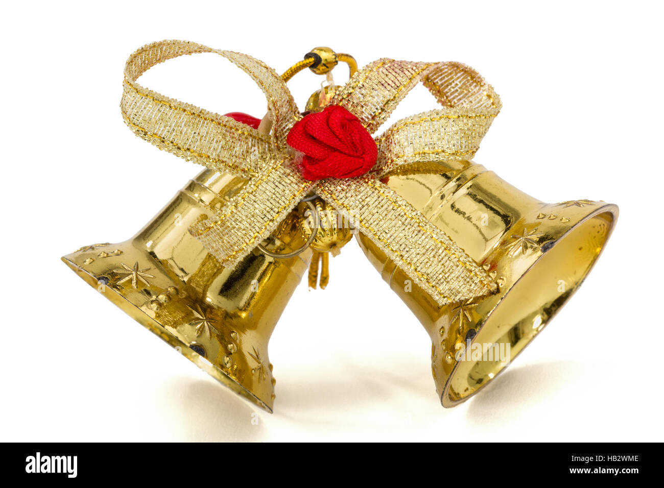 Golden Christmas bells, isolated on white background Stock Photo - Alamy