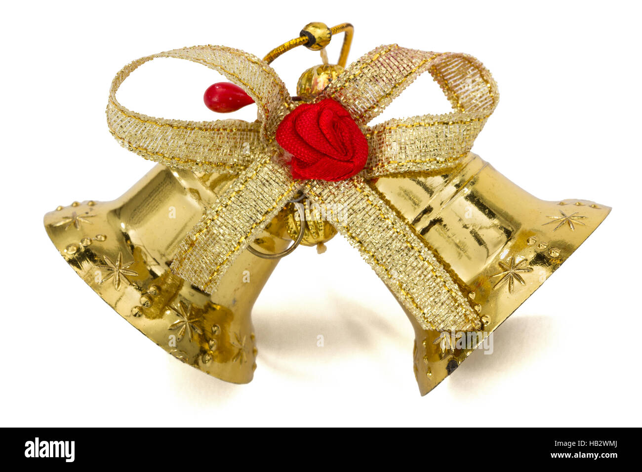 Golden Christmas bells, isolated on white background Stock Photo - Alamy