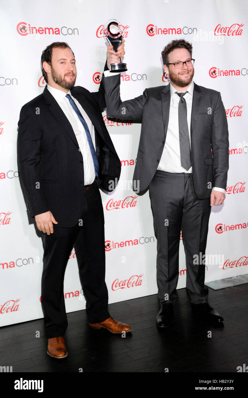 Comedy Filmmakers of the Year award winners Evan Goldberg (L) and Seth Rogen attend The CinemaCon Big Screen Achievement Awards brought to you by The Coca-Cola Company during CinemaCon, the official convention of the National Association of Theatre Owners Stock Photo