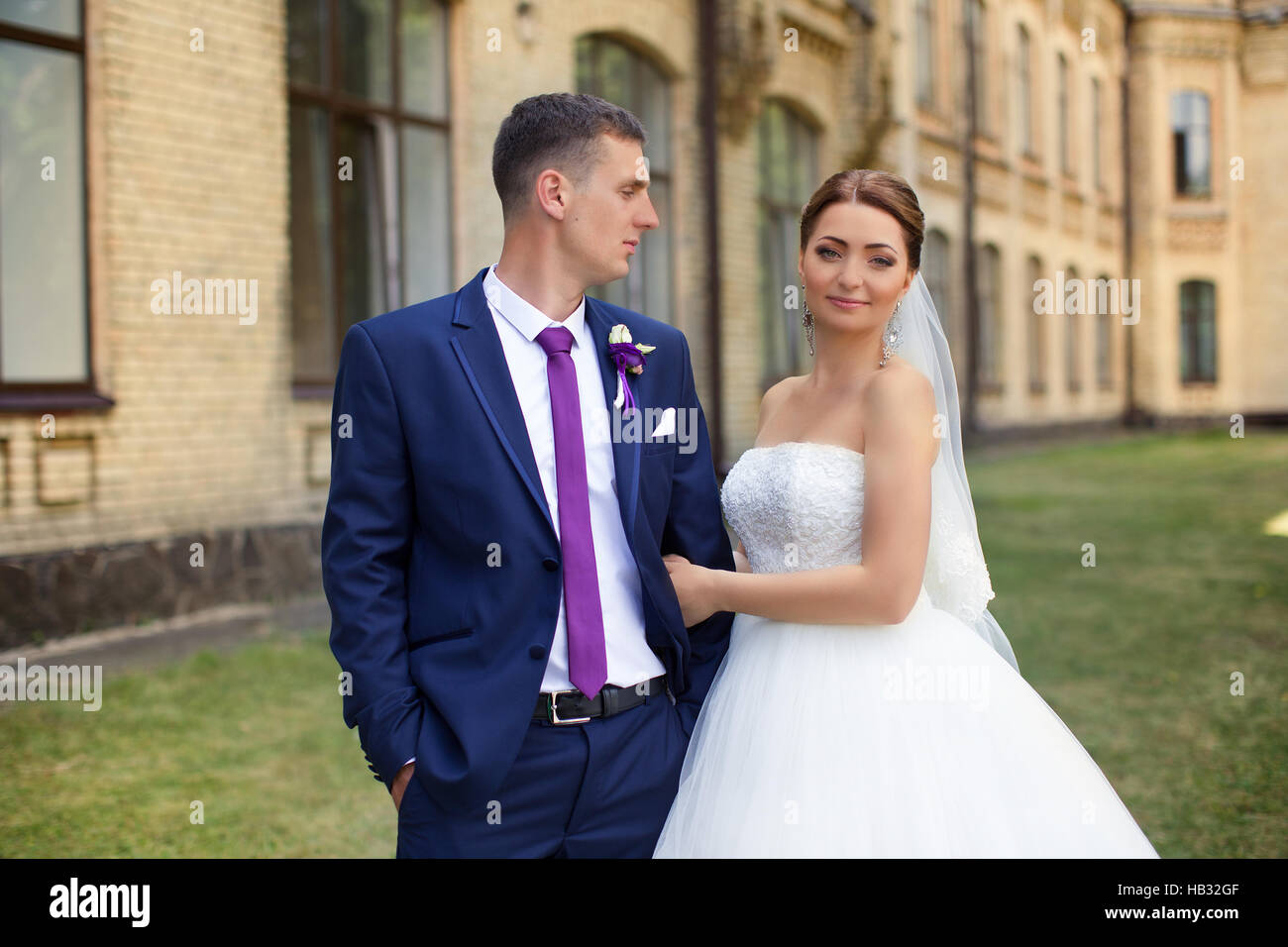 Happy bride and groom at the wedding walk Stock Photo - Alamy