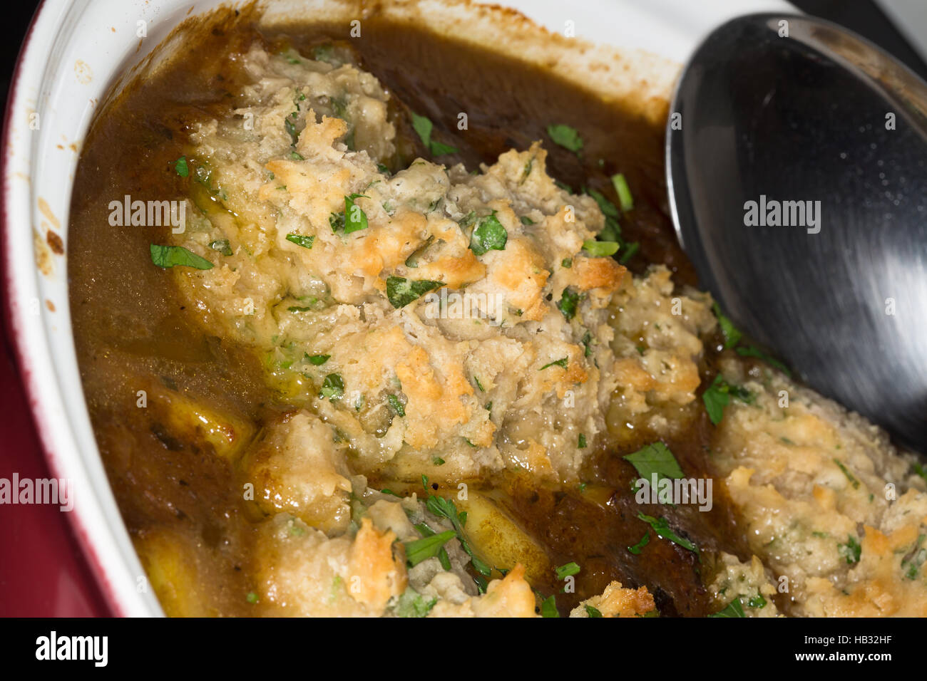 A close up view of homemade Suet Dumplings on Beef Stew Stock Photo Alamy