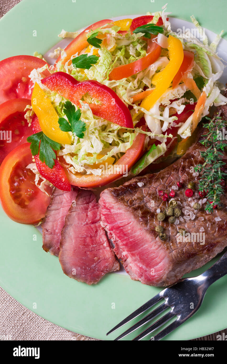 grilled steak with salad Stock Photo - Alamy
