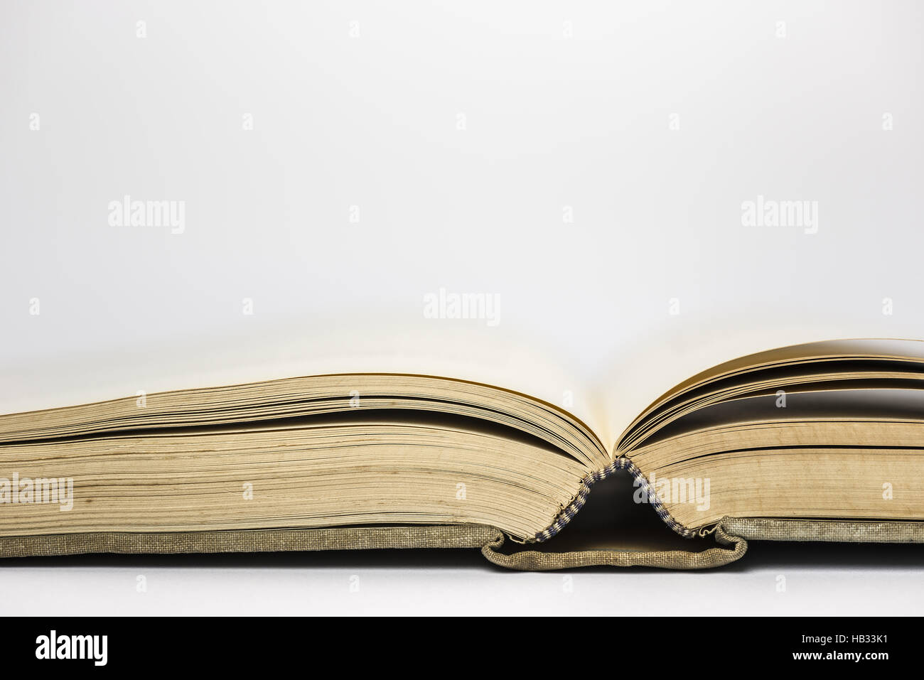 Open old antique book Stock Photo - Alamy