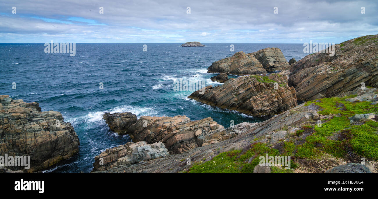 Huge rock and boulder outcrops along Cape Bonavista coastline in Newfoundland, Canada. Stock Photo