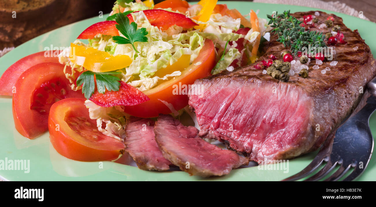 grilled steak with salad Stock Photo - Alamy