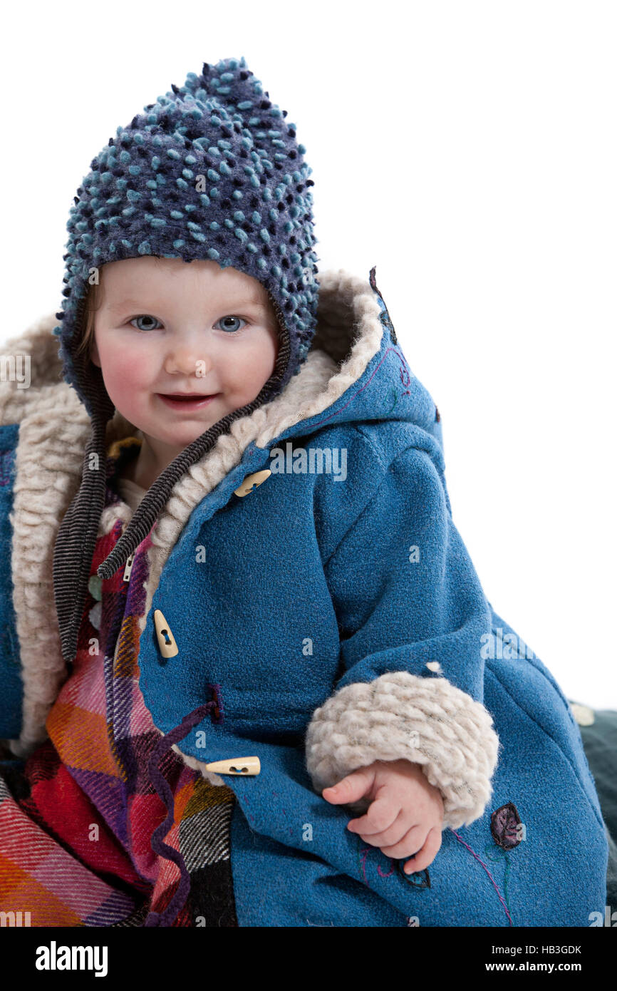 Toddler with winter coat with a hood Stock Photo Alamy