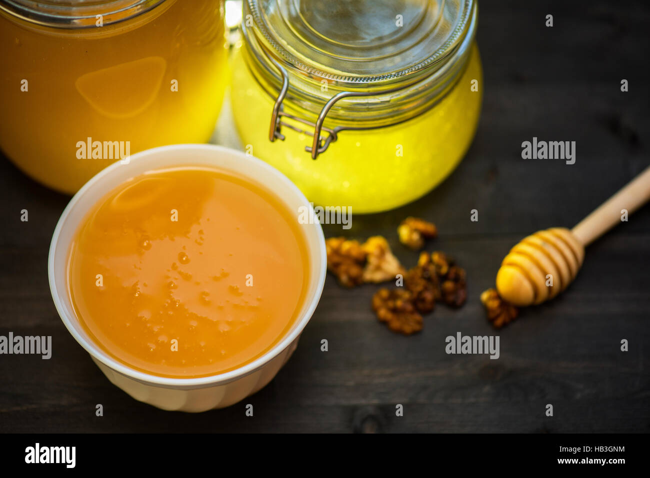 Honey with walnut Stock Photo Alamy