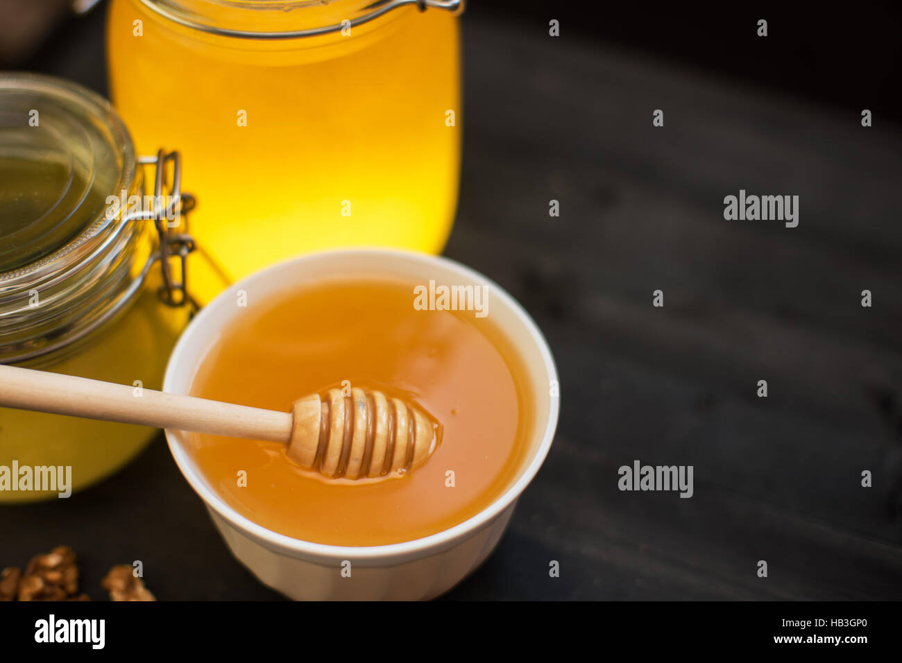 Honey with walnut Stock Photo Alamy