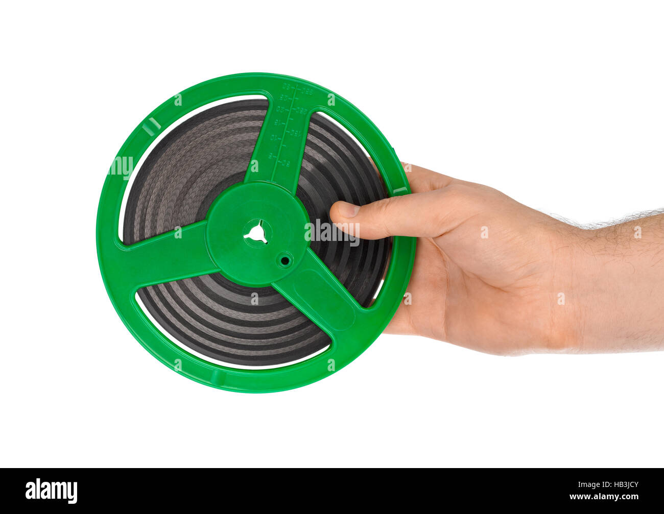 Cinema film reel in hand Stock Photo