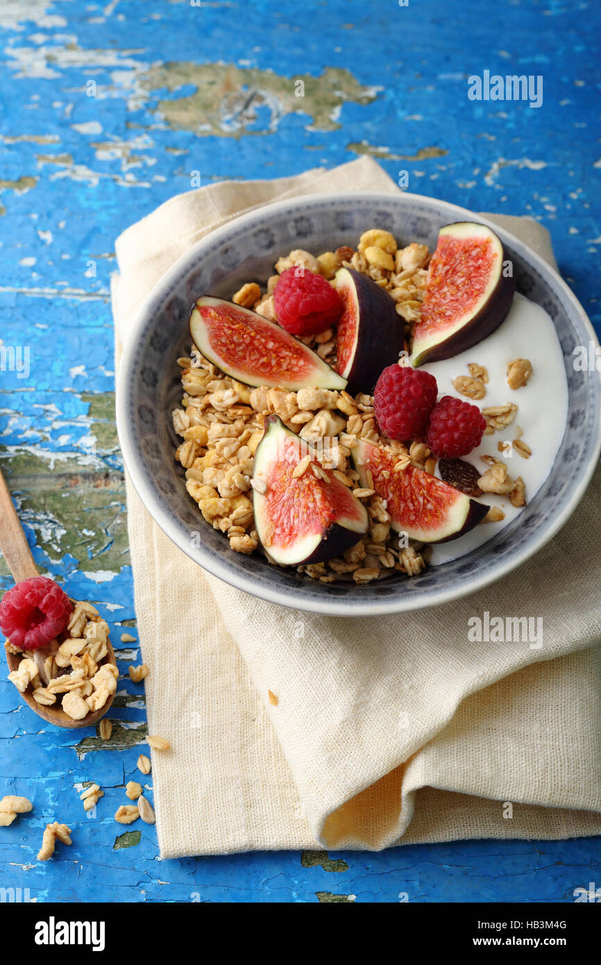 Morning healthy muesli with fig, food closeup Stock Photo