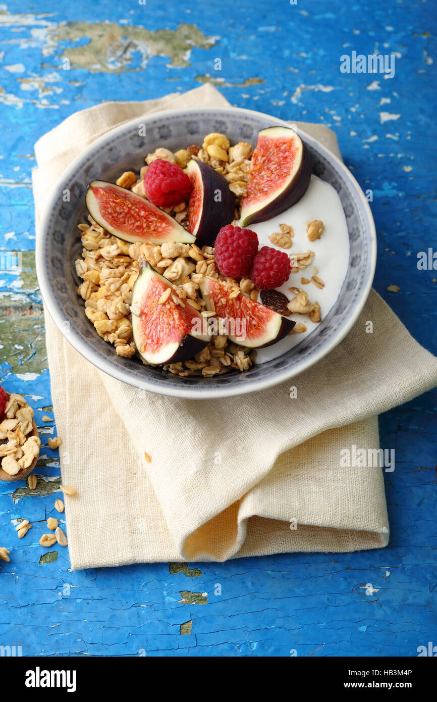Muesli with fresh fig and greek yogurt, healthy eating Stock Photo
