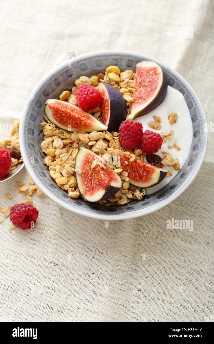 Breakfast bowl with fruits, food closeup Stock Photo