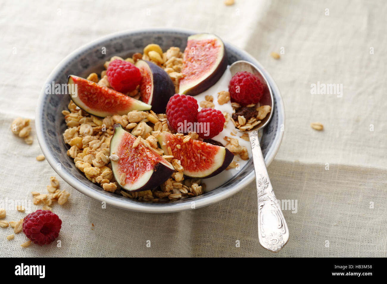 Healthy breakfast with raspberry and fig, food closeup Stock Photo