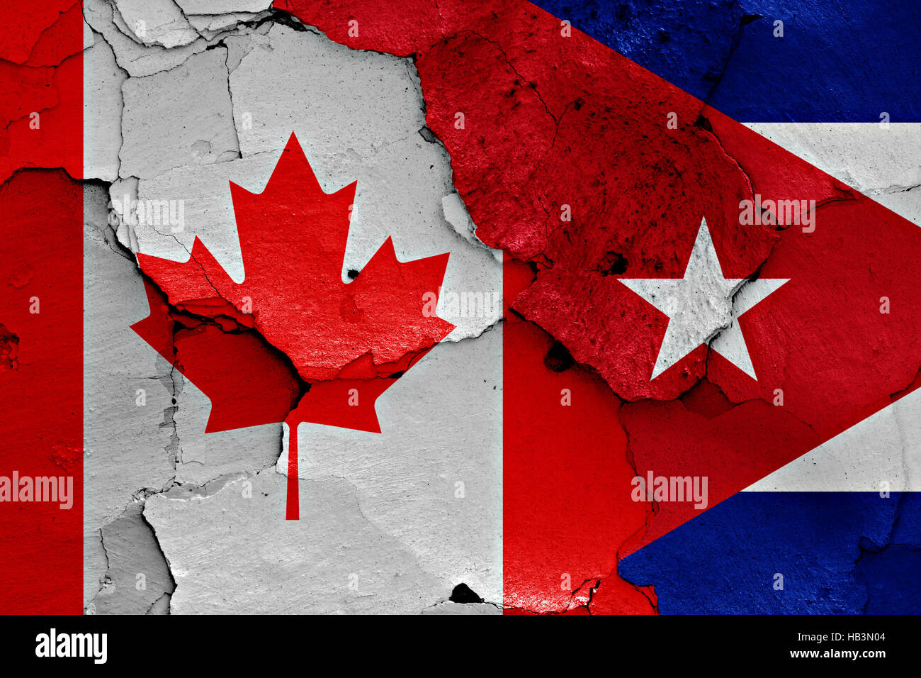 flags of Canada and Cuba painted on cracked wall Stock Photo Alamy