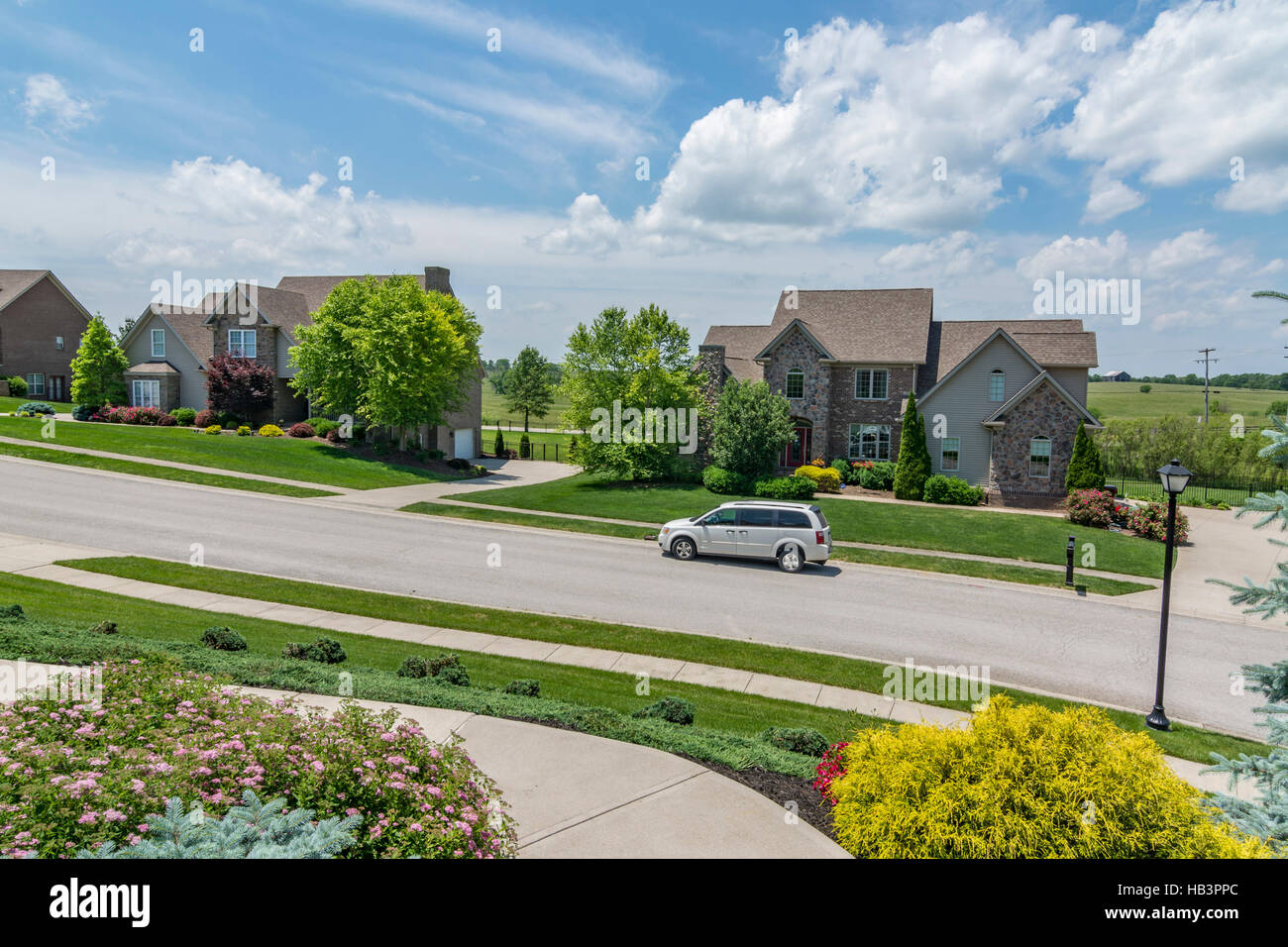 Neighborhood street in Midwest American suburb Stock Photo