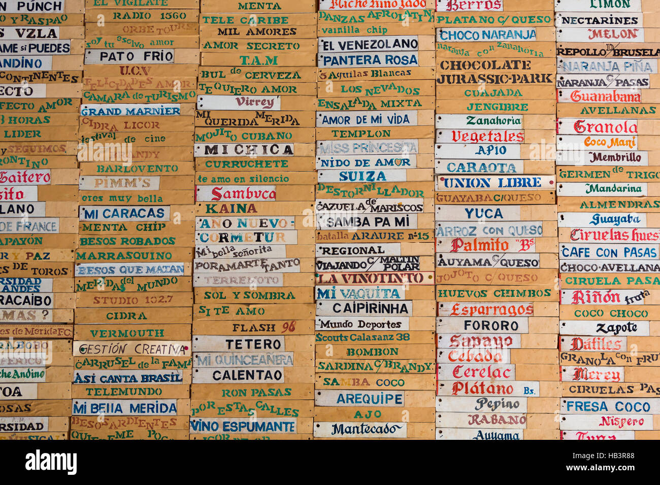 Old wooden board with all ice-cream names written in Spanish, Merida Stock Photo