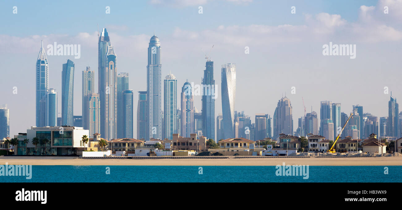 Paradise island and high Marina skyscrapers in Dubai Stock Photo