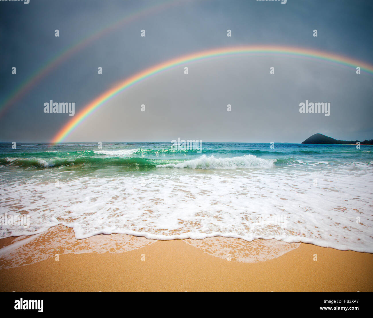 stormy sea and cloudy sky with rainbow Stock Photo - Alamy