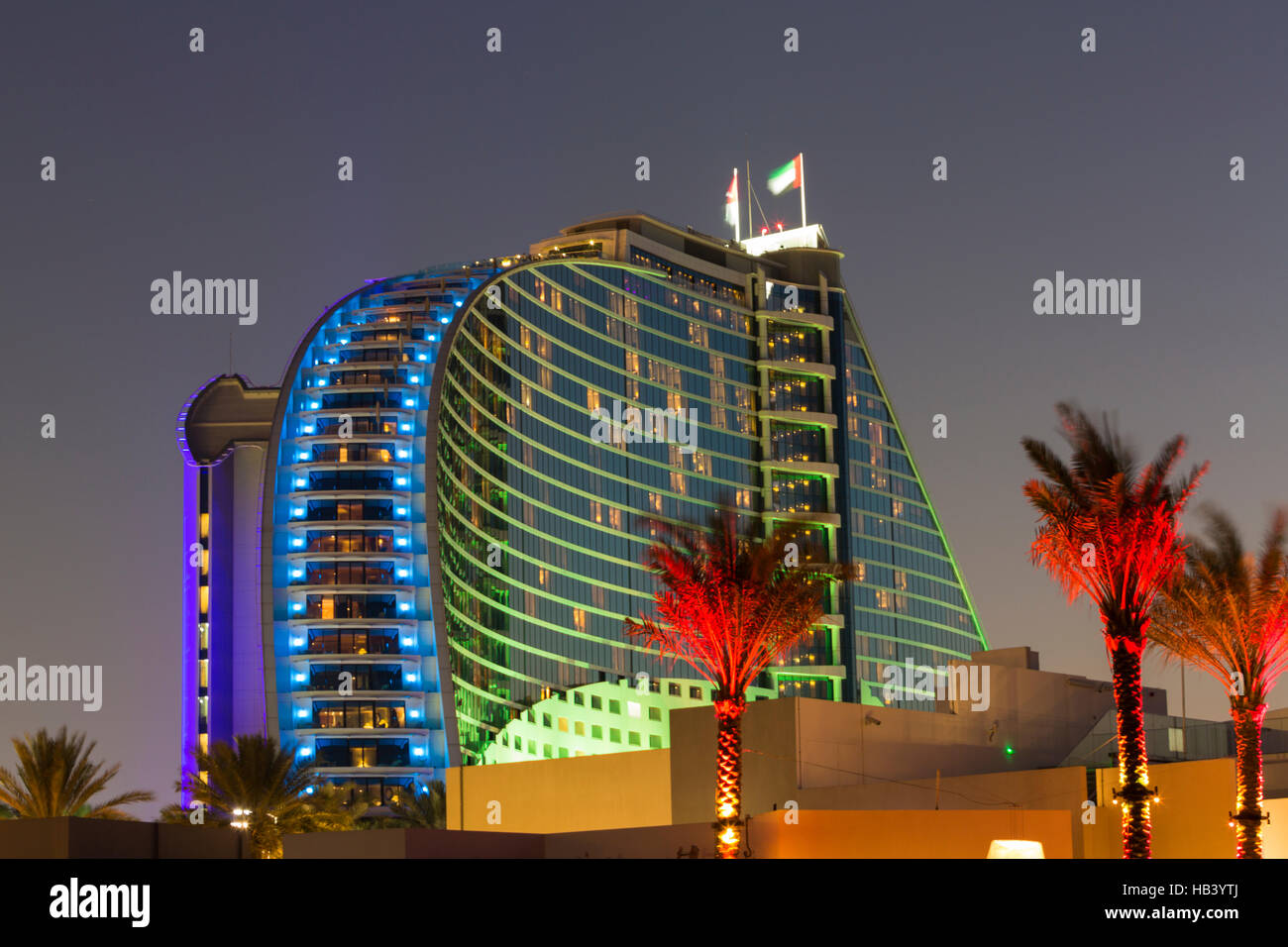 Night illuminations of the modern luxury hotel, Dubai Stock Photo