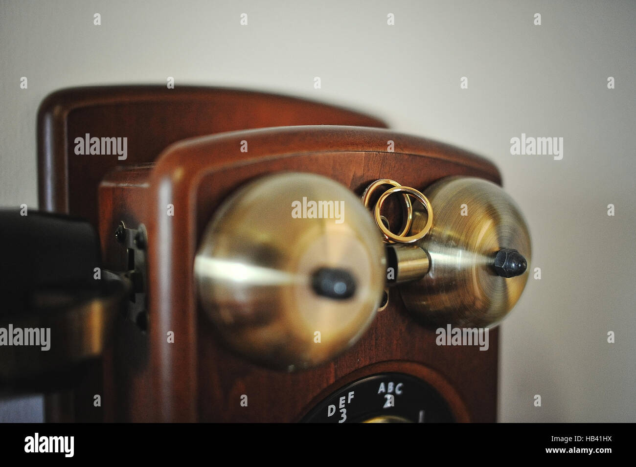 wedding rings on antique phone Stock Photo Alamy