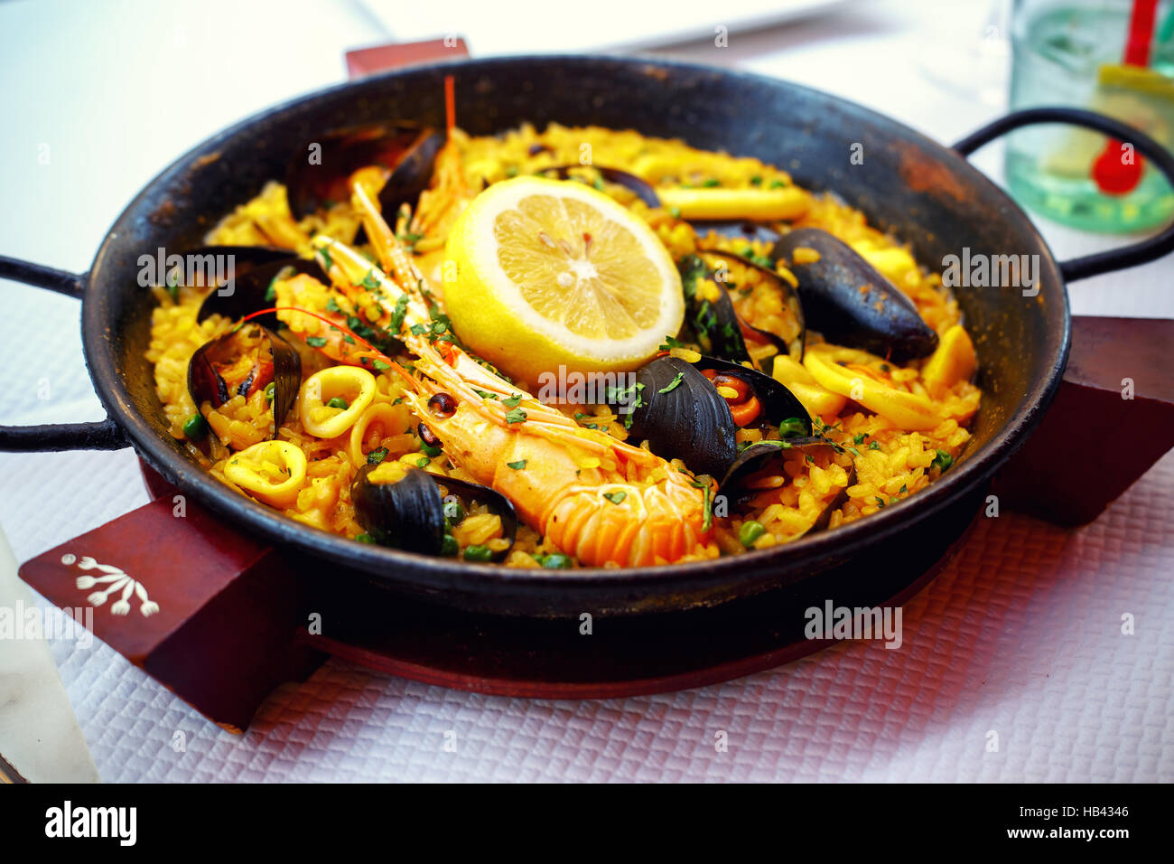 Typical spanish seafood paella in pan Stock Photo Alamy