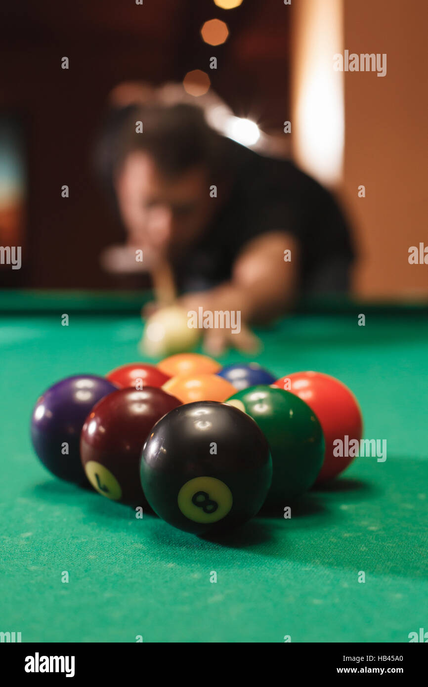 Player breaks a pyramid in billiards Stock Photo Alamy