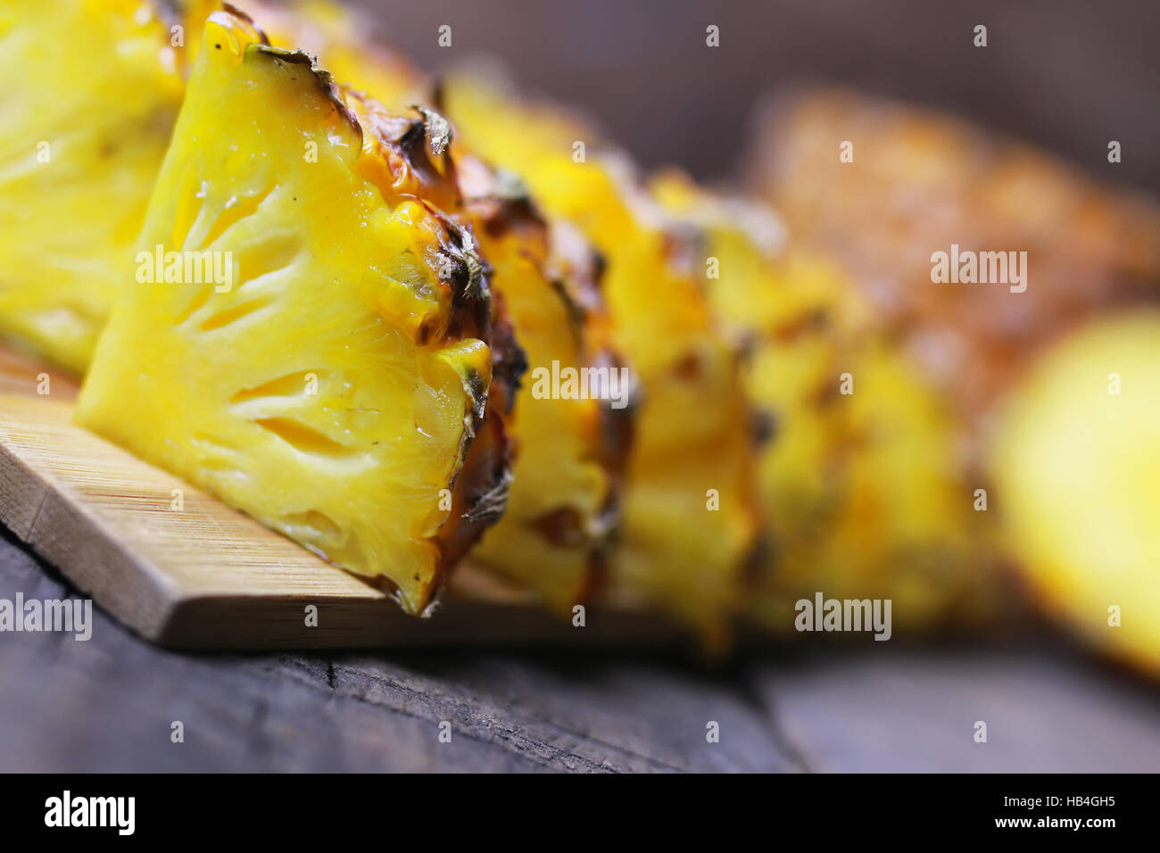 pineapple slices cut knife Stock Photo Alamy